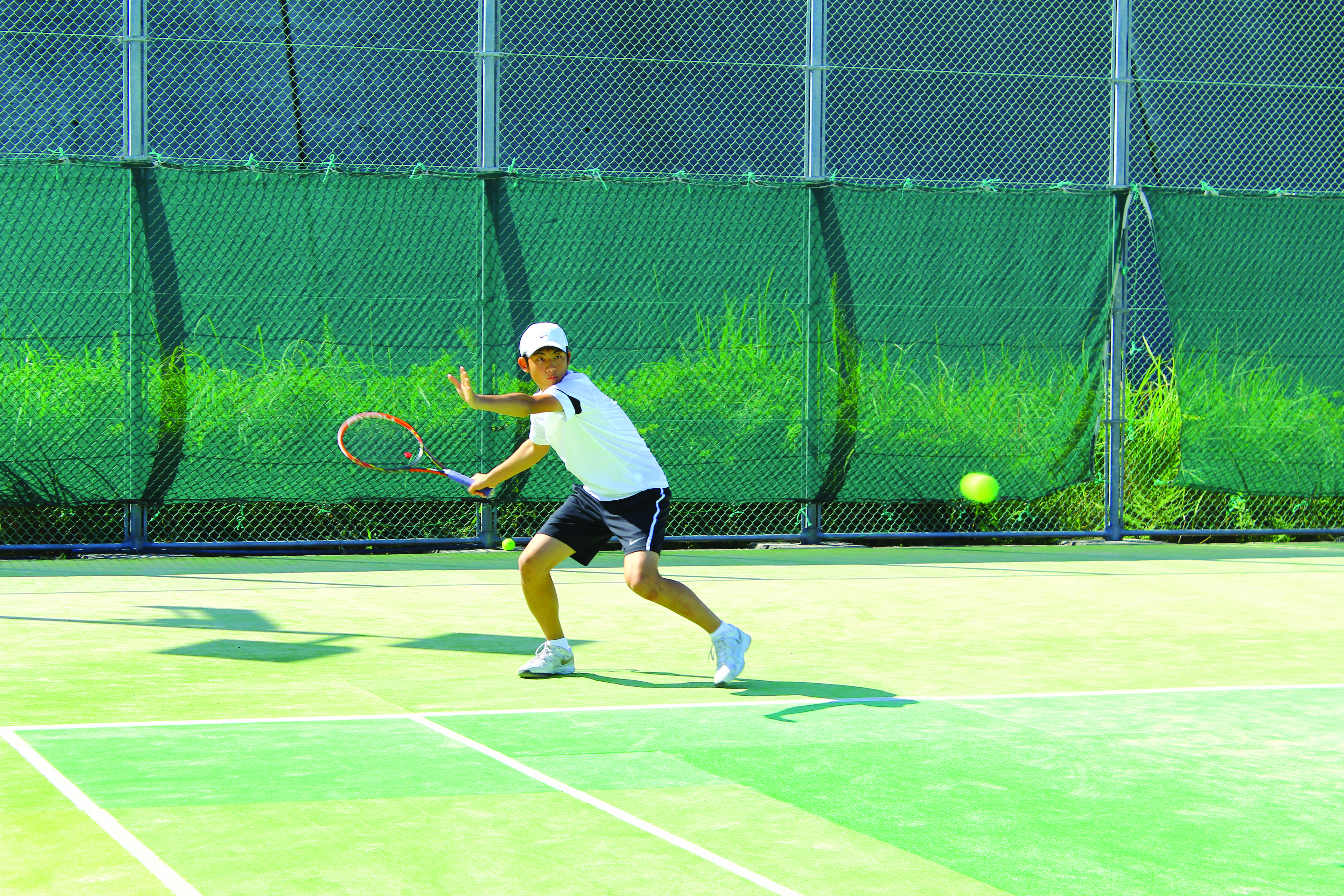 Varsity girls, boys tennis teams bring home championship trophies from AISA Tournament
