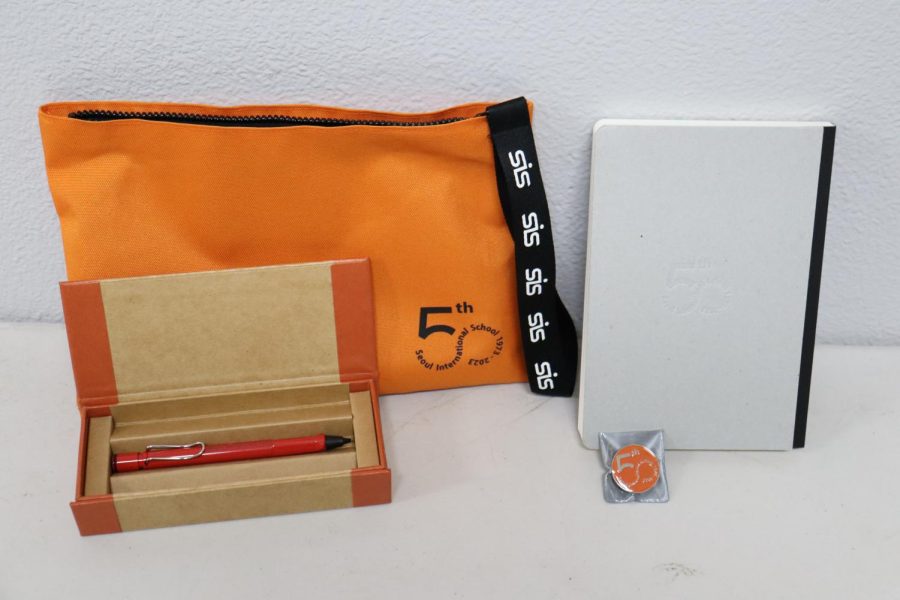 The contents of the 50th anniversary pouch displayed.