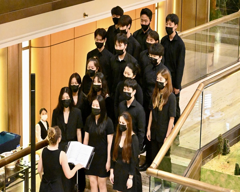 The Ambassadors choir sings at the Hilton