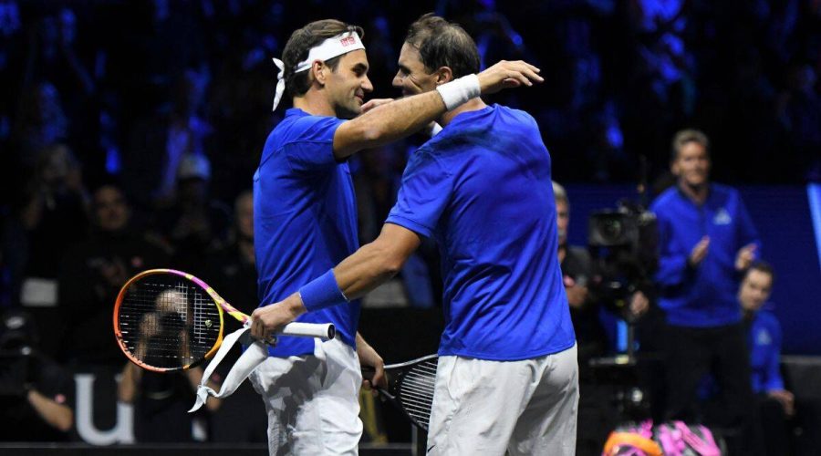 Roger+Federer%28left%29+and+Rafael+Nadal%28right%29+hug+as+Federers+final+match+comes+to+an+end.