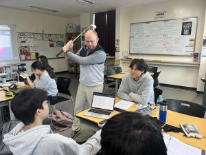 Matthew Halter asserts authority over his students during class.