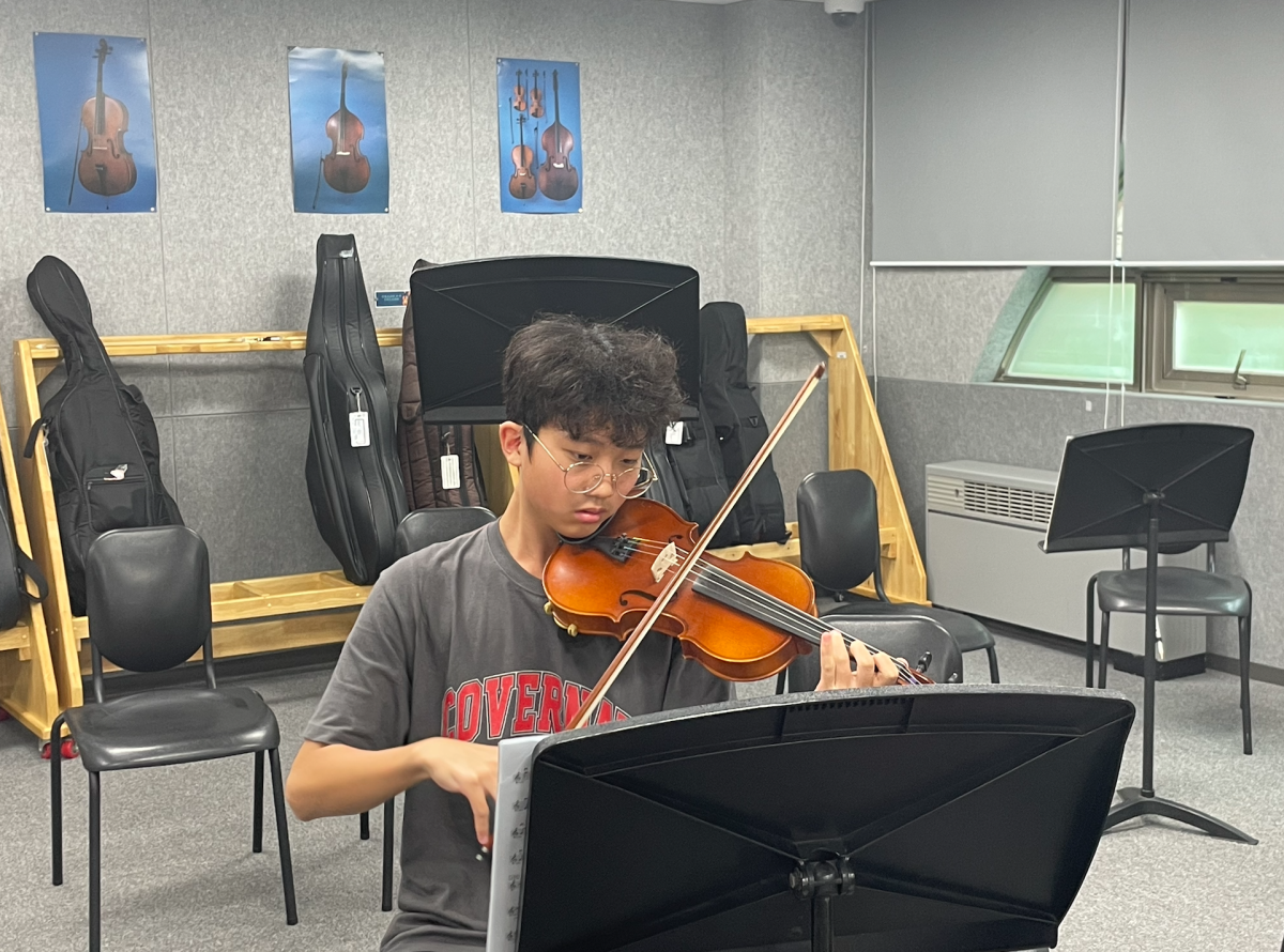 Edward Hwang (9) practicing before the audition