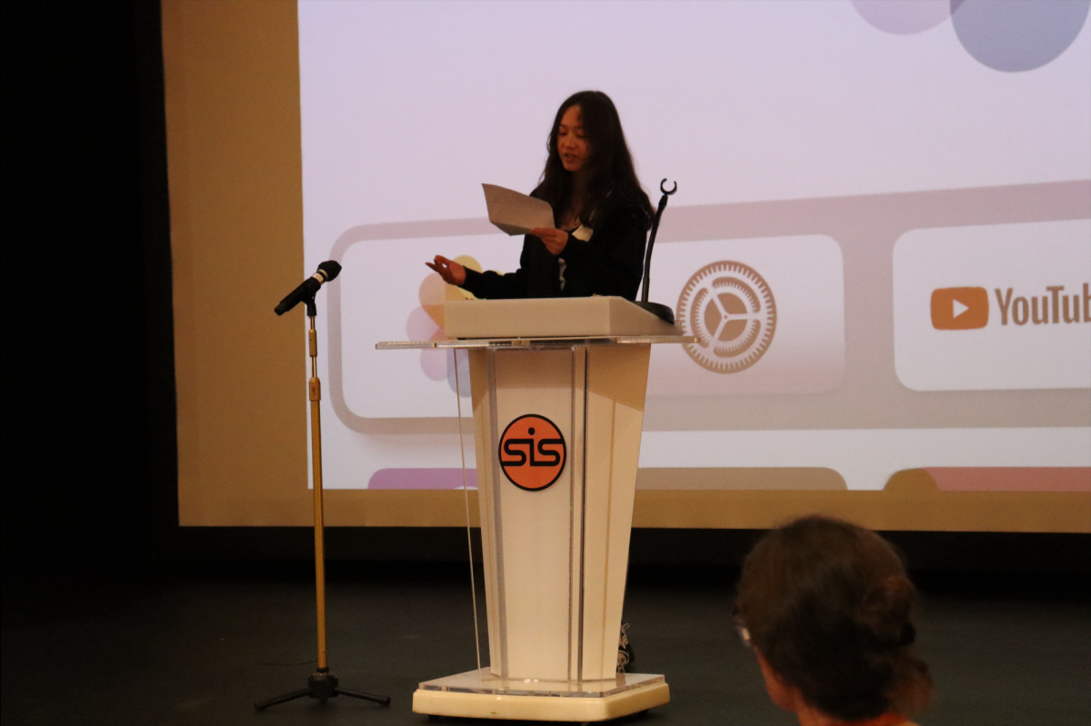 Leona Gohde (9) presents her speech during the election.