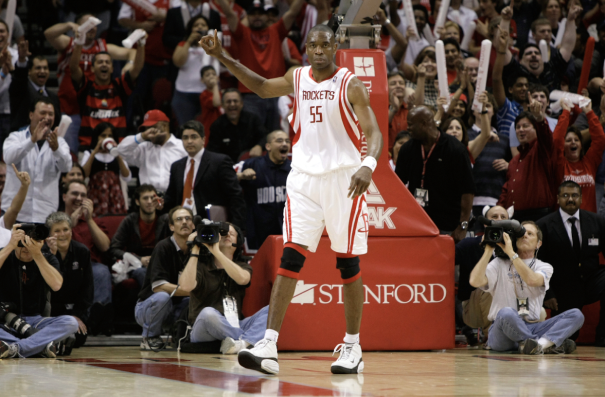 Mutombo does his iconic finger wag after a block in his game. Source: Rolling Stone 