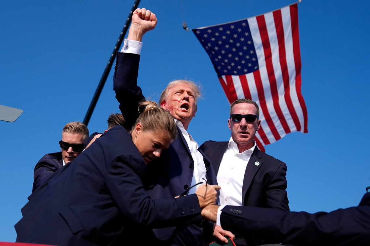 Donald striking an iconic pose after getting shot