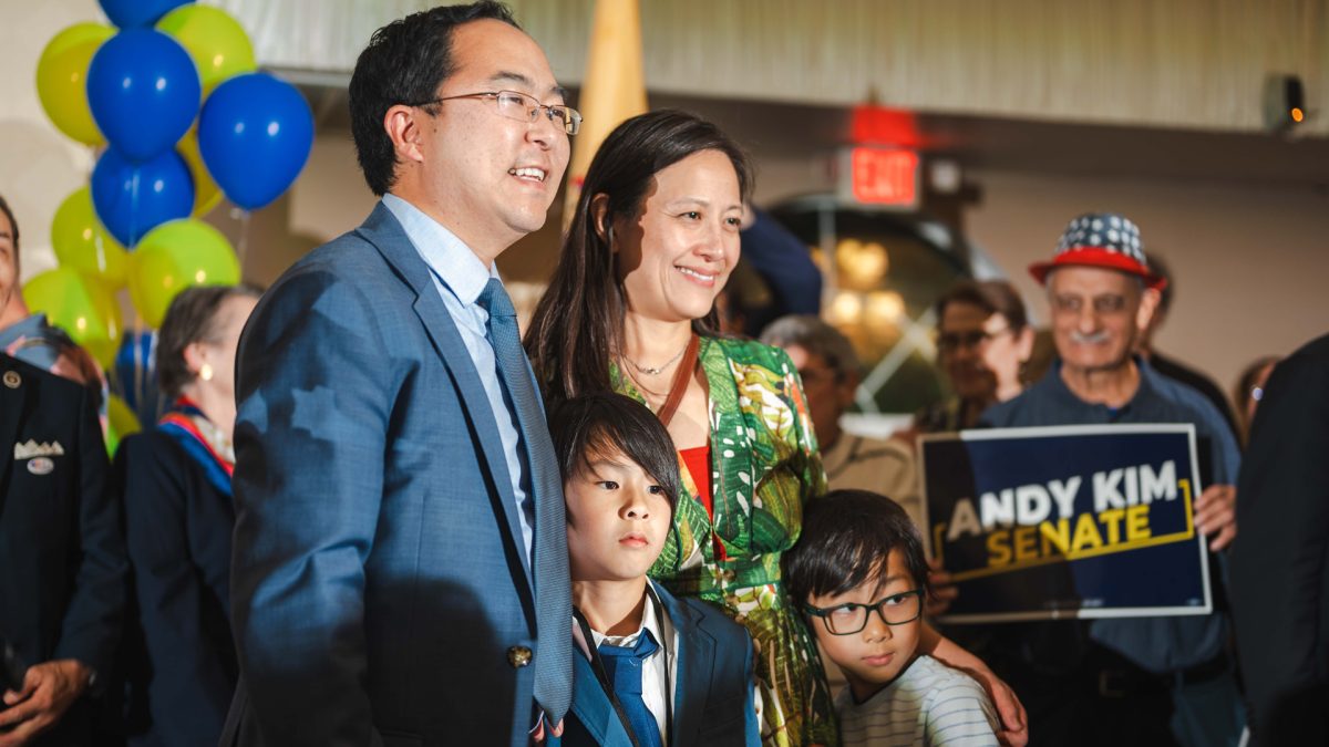 Andy Kim, next to his wife Tammy Lai and his sons at the election night headquarters