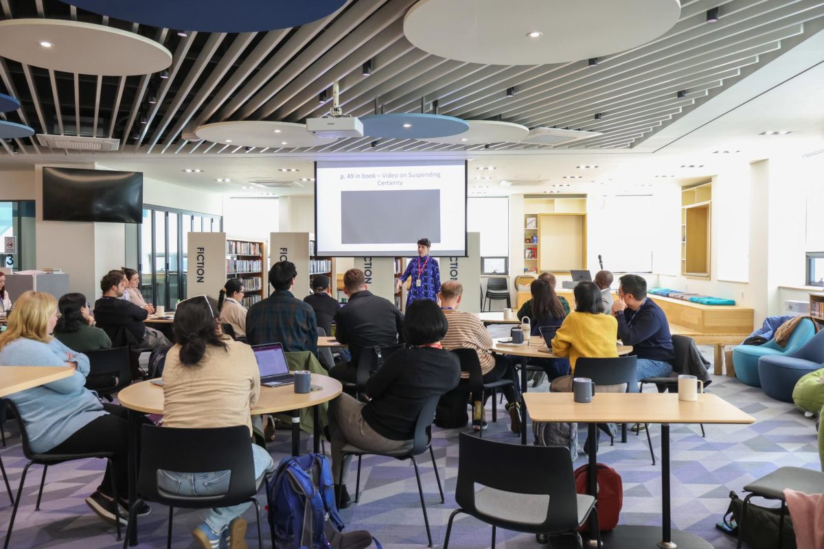 Educators listening to presentation in Secondary Library