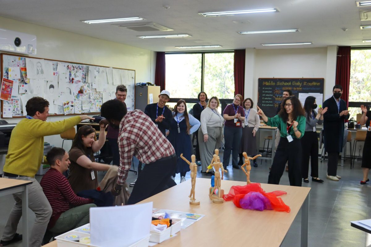 Teachers participating in group activity workshop