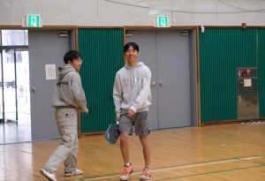 Brian Ji (11) playing a pickleball match.